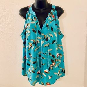 Women’s turquoise blouse with pretty bird print